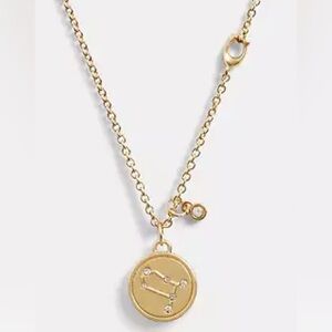 Coach NWT Gemini Coin Pendant Necklace.